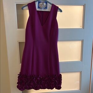 Elegant Purple Sleeveless Dress with Ruffle Hem